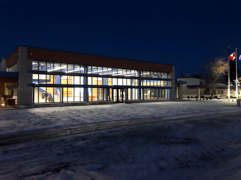 Curtain wall glass building lit at night