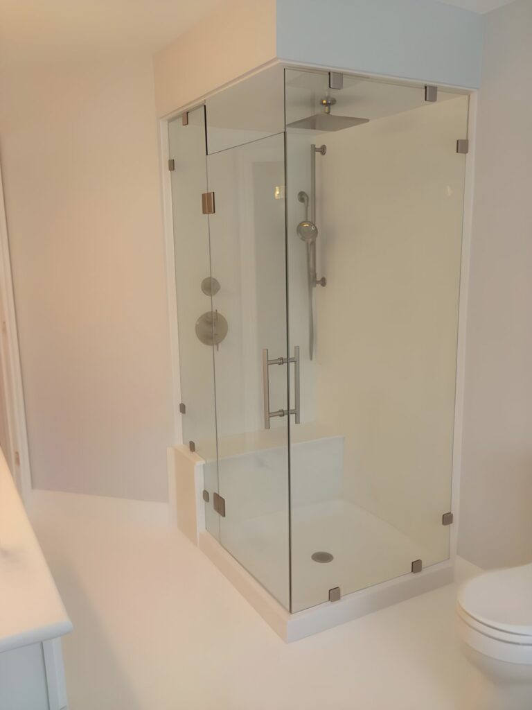 Frameless corner glass shower enclosure